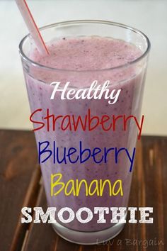 a smoothie in a glass with strawberries and blueberry on the side, text reads healthy strawberry blueberry banana smoothie