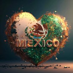 the word mexico written in gold letters on a heart shaped background