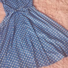 Super cute 60s era dress in blue with white polkadots. Polyester Measurements: 11.50' across waist total 23 inches Size 3 V neck Waist drop 16.5 Total length 39' Cap sleeve Neck line 7' Full skirt/ fitted waist Machine wash warm tumble dry Brand: Miss Kitty tag reads size 12 Excellent vintage condition 1950s Style A-line Polka Dot Dress, 1950s Style Polka Dot Dresses For Spring, Vintage Polka Dot Mini Dress, Vintage Mini Dress In Polka Dot, Spring Polka Dot Vintage Dress, 1950s Style Polka Dot Knee-length Dress, Miss Kitty, 60s Mod, Skirt Fits