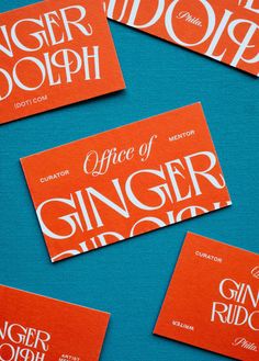 orange and white business cards with the words ginger dolph written on one side