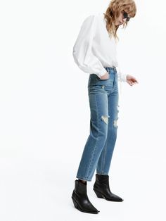 MO&Co. Women's Frayed Detail Ankle Jeans Crafted from pure cotton, these high-waisted, straight-leg jeans feature an edgy distressed design for a vintage look and feel. The ankle-length cut pairs perfectly with ankle boots for a chic and unique style. Features : - High waist, straight leg, ankle length- Zip fly, classic five-pocket design- Distressed design Code: MBD1JENT02The back length of size M/27 is 93.5cmMATERIALS & CARE Material: 100% CottonPlease put it into a mesh bag to washDenim produ Ripped Light Wash Cropped Jeans For Fall, Ripped Medium Wash Cropped Jeans For Fall, Fall Cropped Jeans With Frayed Hem And Relaxed Fit, Fall Ripped Cropped Jeans In Rigid Denim, Ripped Rigid Denim Cropped Jeans For Fall, Chic Rigid Denim Cropped Jeans For Fall, Fall Distressed Cropped Leg Flare Jeans, Fall High Waist Cropped Jeans With Frayed Hem, High Waist Cropped Jeans With Frayed Hem For Fall