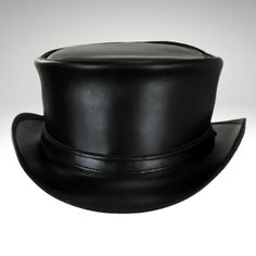 Mens Black Leather Top Hat - Made with genuine leather.  We presents the sleek and streamlined Black Leather Top Hat for those who prefer a simpler design.  Cowhide suede, a narrow self-leather Black Leather Top Hat strap adorns the short pointed crown.  This leather item is handmade with cowhide leather and is from expert craftsmen.  This is a stylish and durable item. Our products are of the highest quality. We guarantee satisfaction. Leather Flat Brim Hat With Leather Lining, Classic Leather Hat With Flat Bill, Classic Leather Flat Bill Hat, Black Leather Hat With Flat Brim, Adjustable Leather Top Hat With High Crown, Black Leather Flat Brim Hats, Black Fitted Leather Hat, Fitted Black Leather Hat, Leather Hat With Flat Crown And Leather Sweatband