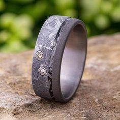 a wedding band that has been made to look like it is in the woods