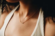 This dainty gold necklace was designed to celebrate the givers of life and the beauty of motherhood. The perfect gift for the mom in your life (yourself included.) ...PS. Call your mom. -18K Gold Vermeil -18” long with adjuster ring at 16” Want to wear it longer? Shop our necklace extenders! Mother's Day 14k Gold-filled Charm Necklaces With Delicate Chain, 14k Gold Filled Necklaces For Anniversary On Mother's Day, Minimalist Everyday Necklaces For Mother's Day, Dainty Birthstone Necklace Gift For Mother's Day, Dainty Birthstone Necklace For Mother's Day Gift, Minimalist Everyday Necklace For Mother's Day, Everyday Yellow Gold Necklaces For Mother's Day, Minimalist Necklaces For Everyday Or Mother's Day, Everyday 14k Gold Necklace For Mother's Day