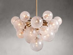 a chandelier with glass balls hanging from it