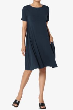 The shift and swing silhouette of this short sleeve dress. The smart work-to-weekend piece has been crafted from comfortable stretch jersey. Can throw it on with a pair of tennis shoes or dress it up with some cute sandals.Boat neck, Short sleeves, Center seam at back, Side-seam pocketsFlowy and flattering, the swing silhouette has a flared A-line shape you can dress up or down. A for effortless.36"nee length, Premium soft jersey knit with comfortable stretchFits true to size, take your normal s Dresses With Short Sleeves, Jersey Dresses, Knit Dresses, The Shift, The Swing, Cute Sandals, Short Sleeve Dress, Jersey Dress, Dusty Blue