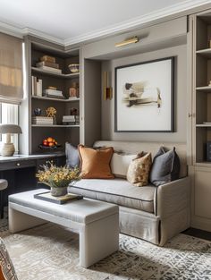 a living room filled with furniture and bookshelves