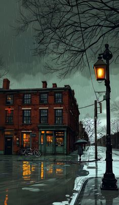 a street light sitting next to a red brick building on a rainy day in the rain