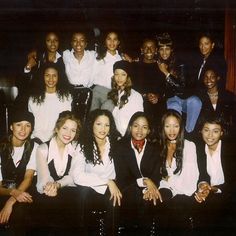 a group of young people posing for a photo