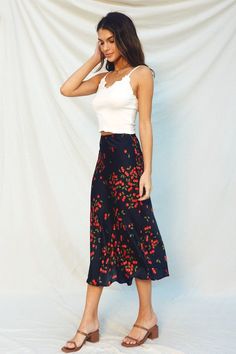 Women's A-Line Midi Skirt 90’s Cherry Bomb Skirt Meet your new statement piece: the 90’s Cherry Bomb Skirt. This A-line Midi skirt will have you turning heads with its retro vibes and bold cherry print. Perfect for adding a playful touch to any outfit. Details Available in sizes: S-L Available in color: Cherry Printed A-Line skirt Bias cut Elastic back band Hidden back zipper Lined Fabric Shell: 55% Viscose and 45% Rayon Lining: 100% Polyester Sizing Small: 2/4, Medium: 6/8, and Large: 10/12 Len Moroccan Oil Hair, Skirt Model, Youth Clothing, Satin Midi Skirt, Cherry Bomb, Cherry Print, Skirt Fits, Denim Coat, Romper Pants