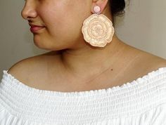 "Handmade hand-embroidered Statement Flower Earrings. Purely hand-embroidered oversized thread and beads earring. These Earrings look awesome for the spring-summer. Earrings measure about approx. 3 \" in diameter. Available here in four colors: White Red Yellow Peach Blue Each Carnation jewellery piece is handmade and handcrafted in India. PS: Please note, Since our product is purely handmade in nature hence a slight imperfection may be there. The colours and patterns may slightly vary from the Bohemian Beige Earrings For Spring, Handmade Beige Flower-shaped Earrings, Handmade Flower Earrings For Summer Weddings, Handmade Summer Wedding Flower Earrings, Summer Wedding Handmade Flower Earrings, Handmade Beige Flower Earrings As Gift, Handmade Beige Flower Earrings For Gift, Beige Flower-shaped Earrings For Gift, Beige Flower Earrings For Gift