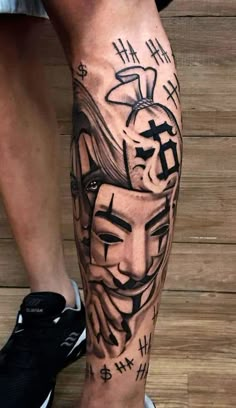 a man's leg with tattoos on it and an image of a person wearing a mask