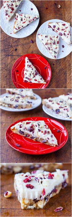 slices of cheese pizza on red plates with cranberries and pecans in the background