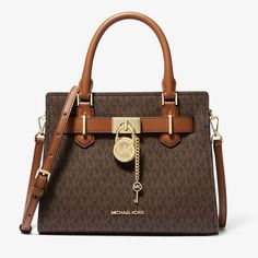 Hi This Is A Brand New Michael Kors Women's Handbag Called Hamilton In The Medium Size. This Bag Was A Gift But I Don't Use Large Satchel Bags So It Might Be Perfect For Your Collection. This Is Def A Statement Purse. Here's The Online Product Description: 35f1ghms2b-Brown (33 X 16 X 22 Cm) Material: Leather Locking Type: Magnet Scope Of Delivery: Including Brandedui Dimensions Approx.: 33 X 16 X 22 Cm Let Me Know If You Have Any Questions. It Will Be Delivered How It's Packaged In The Last Phot Shopping Tote Bag With Turn-lock Closure, Brown Coated Canvas Bag With Metal Hardware, Shopping Bag With Turn-lock Closure And Top Handle, Michael Kors Leather Bags With Turn-lock Closure, Luxury Michael Kors Bag With Turn-lock Closure, Gold Travel Bag With Turn-lock Closure, Michael Kors Bag With Turn-lock Closure, Michael Kors Bags With Turn-lock Closure For Everyday, Michael Kors Tan Bag With Gold-tone Hardware