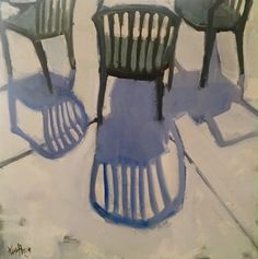 three chairs sitting next to each other on top of a white tile floor with blue paint