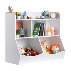 a white book shelf filled with lots of toys