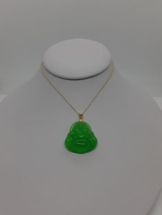 "Green Jade Buddha in gold plated Pendant / Necklace 16\" - 2\" Expended Chain Unisex. Product Info: -Dimensions:25mm x 25mm. -Metal:925 Sterling Silver over Gold Plated -Finish: Gold Plated. -Stone Count: Green Jade. -Chain Length:16\" + 2\" extension. -Weight:6.89 grams. -Nice Gift box is included" Green Jade Jewelry With Adjustable Chain, Green Necklace With Large Pendant As A Gift, Green Jewelry With Large Pendant For Gift, Green Large Pendant Jewelry Gift, Green Round Large Pendant Jewelry, Green Jade Jewelry With Large Pendant, Jade Buddha Necklace, Buddha Gold, Jade Buddha