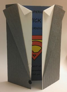 an origami superman suit and tie made out of paper