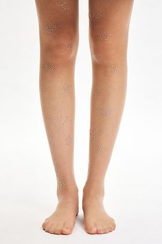 Luxe sheer tights with an allover glitter star finish we love. Features Glitter star tights Luxe sheer tights Allover glitter star finish Content + Care 88% Nylon, 12% spandex Hand wash Imported Size + Fit S/M 4'10" -5'6" 90-130lbs L/XL 5'7" -5'6" 130-200lbs | Glitter Star Tights in Beige, Women's at Urban Outfitters Winter Ball Dresses, Star Tights, Sparkle Tights, Sparkly Tights, Glitter Tights, Winter Ball, Dance Tights, Sheer Tights, Fall Clothes