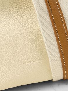 Luxury Beige Pebbled Leather Shoulder Bag, Luxury Cream Shoulder Bag With Leather Trim, Luxury Grained Texture Rectangular Shoulder Bag, Designer Cream Leather Shoulder Bag, Luxury Cream Shoulder Bag With Leather Lining, Luxury Cream Shoulder Bag With Leather Handles, Luxury Cream Textured Leather Shoulder Bag, Luxury Beige Shoulder Bag With Leather Backing, Cream Leather Shoulder Bag With Leather Lining