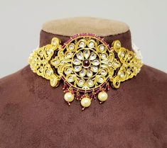 Check out this item in my Etsy shop https://www.etsy.com/listing/1215128306/gold-kundan-choker-necklace-set-south Adjustable Round Kundan Necklace As Gift, Gold Plated Choker For Festivals As A Gift, Gold Plated Choker For Festivals And Gifts, Adjustable Round Jewelry Sets For Festivals, Adjustable Round Jewelry Sets For Festive Occasions, Adjustable Festive Jewelry Sets, Intricate Design Kundan Choker Necklace Gift, Round Gold Plated Kundan Necklace For Festivals, Gold Plated Kundan Necklace For Festivals