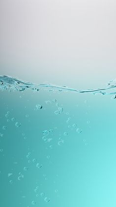 the water is very clear and blue with bubbles