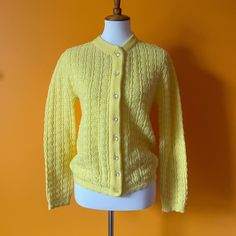 "1960s Baby Yellow Cardigan 🐥 by Bernice Creations. 100% Orlon acrylic. Super darling! See measurements to ensure desired fit. MEASUREMENTS: *taken flat WHILE BUTTONED, double where needed* TOTAL LENGTH: 23\" CHEST: 17\" WAIST: 17\" BOTTOM HEM: 16\" SHOULDERS: 16\" SLEEVE LENGTH: 24\" CONDITION: Good vintage shape. Some pilling due to age! SHOP POLICY: Thank you for your interest! All sales completed with Sunny Girlfriend Retro are final. Buyers are responsible for checking measurements of garm Fitted Button-up Retro Cardigan, Retro Fitted Button-up Cardigan, Retro Fitted Sweater With Button Closure, Vintage Knit Outerwear With Button Closure, Fitted Vintage Knitted Cardigan, Vintage Spring Sweater With Buttons, Vintage Knit Outerwear With Buttons, Retro Button-up Cardigan, Retro Button-up Spring Sweater