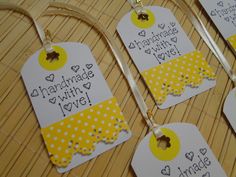 four tags that say i love you and have yellow polka dots on the bottom one