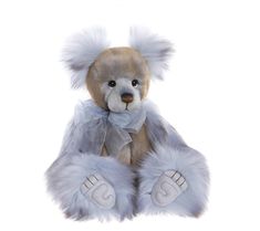 a brown teddy bear with white fur on it's arms and legs, sitting in front of a white background