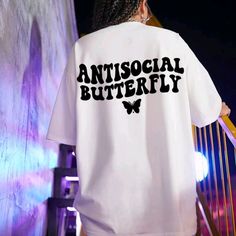 Brand New! Perfect T-Shirt To Normalize Mental Health. It's Ok To Be An Antisocial Butterfly Antisocial Butterfly Shirt, White Boxy Fit T-shirt With Text Print, White Boxy Fit T-shirt With Letter Print, White Drop Shoulder T-shirt With Graphic Print, White T-shirt With Back Print For Summer, White Hip Hop Slogan Top, Summer Boxy Fit T-shirt With Letter Print, Oversized White Top With Front Print, White Oversized Top With Front Print