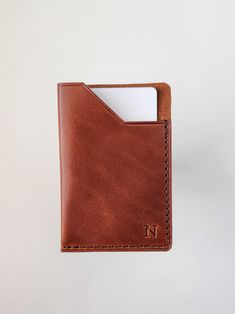 This Clark leather wallet can be molded to hold 4-6 cards very comfortably. Makes a great front pocket wallet with uniquely finished edges for a superior look. Material: Full-Grain American Leather Dimensions: 3.8in x 2.75in Holds 4-6 cards and some bills. Handcrafted in Alabama, USA -Because leather is an organic material, there will be variations in color & texture from piece to piece. Bifold Card Holder With Slots For Everyday Use, Everyday Bifold Card Holder With Id Window, Brown Wallet With Id Window For Everyday Use, Bifold Card Holder With Interior Slots, Classic Rectangular Card Holder With Flat Pocket, Classic Bifold Card Holder With Flat Pocket, Bifold Card Holder With Card Slots, Trifold Card Holder With Card Slots For Daily Use, Bifold Card Holder With Flat Pocket For Daily Use