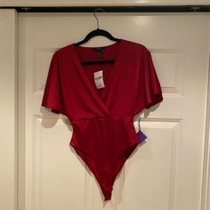 New With Tags. Red V Neck Bodysuit. Flutter Sleeves. Stretchy Material Red Bodysuit, V Neck Bodysuit, Forever21 Tops, Flutter Sleeves, Forever 21 Tops, Flutter Sleeve, Stretchy Material, Forever 21, Womens Tops