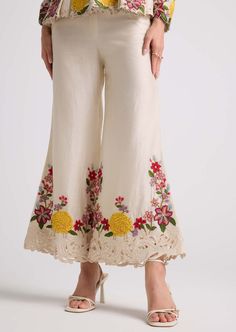 Step into elegance with this ivory floral chanderi bell bottom pants, intricately detailed with delicate threadwork and exquisite beadwork. These pants exude sophistication and charm, adding a touch of refinement to any ensemble. Embroidered Pants, International Style, Bell Bottom Pants, Floral Fashion, Bell Bottom, Bell Bottoms, Embroidery Patterns, Bead Work, Custom Sizing