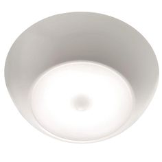 an overhead view of a white ceiling light