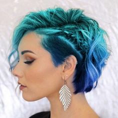 Long Wavy Pixie With Undercut, Short Hair Bright Colors, Asymmetrical Bob Shaved Side, Types Of Mohawks, Fashion Colored Hair, Short Fun Hair Color, Short Edgy Hairstyle Women Round Face, Short Bright Hair, Fashion Color Pixie Hair