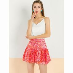 You're ready for a fab and stylish season with this ruffle mini skirt. Pair it with your favorite tops and heels for a chic look. Flutter through your day in this fabulously feminine ruffled mini skirt. Nothing offers a charming appeal like the ruffle-layer skirt. Complete your cute style in this floral ruffle mini skirt. A nice choice for a Valentine's Day outfit. Flirty Mini Skort For Summer, Flirty Skirted Skort For Summer, Flirty Summer Skort, Flirty Ruffled Mini Skirt For Summer, Flirty Ruffled Mini Skirt For Vacation, Chic Ruffled Mini Skirt For Spring, Summer Skirted Skort With Ruffles, Ruffled Skirted Skort For Summer, Flirty Lined Mini Skirt For Summer