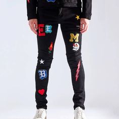 * Embellish Nyc Men's Jean * Embroidered Patches * Skinny Fit * Stretch Fabric * 98% Cotton, 2% Spandex * 34" Inseam * Imported * Mpn Embhol21-2-2 * Msrp $145 Black Graphic Print Jeans For Spring, Black Embroidered Cotton Bottoms, Spring Graphic Print Black Jeans, Embroidered Black Bottoms For Streetwear, Black Embroidered Bottoms For Streetwear, Black Cotton Jeans With Graphic Print, Black Jeans With Graphic Print For Fall, Fitted Embroidered Black Bottoms, Light Wash Ripped Jeans