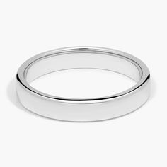 a white gold wedding ring on a white background