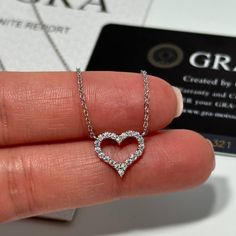 New Sterling Silver And Moissonite Heart Shaped Pendant Necklace 20x 0.015 Carat Diamond Cut Stones. 0.3 Total Carat Weight. Gra Certified. Diamond Test Positive. Pendant Size: 13mm X 12mm Chain Length: 17.6" - 19.6" Comes With Gift Box. White Heart-shaped Diamond Necklace For Formal Occasions, White Heart-shaped Diamond Necklace For Formal Events, White Heart Diamond Necklace For Formal Occasions, Brilliant Cut White Diamond Open Heart Necklace, White Diamond Open Heart Necklace For Anniversary, White Open Heart Diamond Necklace For Anniversary, White Heart Pendant Necklace For Formal Occasions, Macy's Diamond White Diamond Necklace Gift, White Diamond Open Heart Necklace