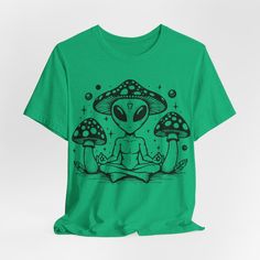 an alien is meditating in front of two mushrooms on a green t - shirt