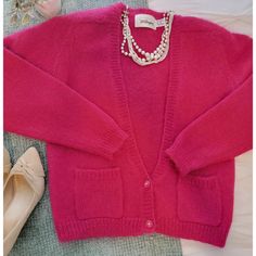 Rare New With Plastic Tag With Extra Buttons And Thread, Never Worn, Right From The Department Store In The 1980s! Cropped Deep V Cardigan Sweater Fuchsia Pink Sweater Shoulder Pads Retro. Size Is Small But It Is Slightly Oversized Could Fit Small Or Medium. Very Soft, Button Front. Approx. Measurements Laying Flat Armpit To Armpit 20" Length: 22" 49% Mohair 51% Acrylic Classic Pink Winter Cardigan, Classic Pink V-neck Cardigan, Classic Pink Sweater For Fall, Vintage Pink Winter Cardigan, Pink Vintage Winter Cardigan, Fuchsia Pink, Shoulder Sweater, Pink Sweater, Department Store