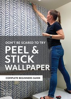 a woman is standing on a scale and painting the wall with blue paint that says, don't be scared to try peel and stick wallpaper complete beginner guide