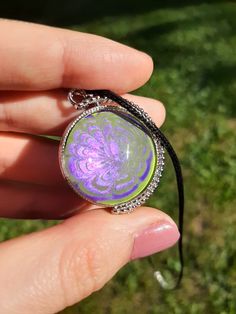 This spinning moon necklace is made with two hand-marbled purple and green glass cabochons,  and comes on a 20' cotton cord with a lobster claw clasp.  Great gift for the witchy woman in your life! If you are interested in a custom order, or want a different type or length chain, please send me a message or leave a note Want a little extra something for yourself? Add a scoop of crystal confetti to your order for $3! https://www.etsy.com/LittleEccentricities/listing/1455372707/little-eccentricities-confetti-crystal?utm_source=Copy&utm_medium=ListingManager&utm_campaign=Share&utm_term=so.lmsm&share_time=1680734991378 Please note that all our shipping prices DO include the price for us to use third-party insurance for your packages. That extra $.80-$1.00 that you pay goes towards double ensur Full Moon Necklace, Crystal Confetti, Purple Moon, Witch Gift, Hippy Gifts, Necklace Purple, Purple Necklace, Witchy Woman, Lobster Claws