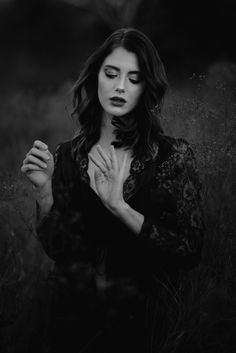 black and white photograph of a woman praying