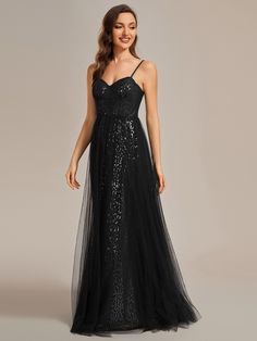 Be the embodiment of glamour and sophistication in our Spaghetti Straps Illusion Sleeveless A-Line Sequin Evening Dress with Tulle Cover. The alluring illusion neckline and delicate spaghetti straps frame your shoulders, while the A-line silhouette flatters your figure with its flowing and feminine shape. Adorned with shimmering sequins, this dress will make you the center of attention at any upscale event or red carpet affair. Pair with a chic updo and statement earrings for a truly show-stopping look. Black Tulle Dress With Illusion Neckline, Formal Tulle Evening Dress With Spaghetti Straps, Tulle Evening Dress With Fitted Bodice And Spaghetti Straps, Tulle Evening Dress With Spaghetti Straps And Fitted Bodice, Tulle Evening Dress With Spaghetti Straps, Tulle Evening Dress With Spaghetti Straps For Prom, Spaghetti Strap Tulle Evening Dress For Prom, Tulle Evening Dress With Sheer Bodice And Spaghetti Straps, Sheer Bodice Spaghetti Strap Tulle Evening Dress