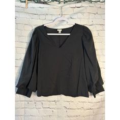 This Top Has Never Been Worn And In Excellent Condition! Very Stylish And Soft. Black V-neck Top For Brunch, Black V-neck Top For Workwear In Fall, Black V-neck Top For Fall Workwear, Balloon Sleeve Top, A New Day, New Day, Top Blouse, V Neck, Womens Tops