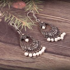 Check out this item in my Etsy shop https://www.etsy.com/listing/778558221/oxidized-silver-plated-white-beaded-hook Bohemian Silver Chandelier Earrings With Pearl Drop, Silver Bohemian Chandelier Earrings With Pearl Drop, Elegant Beaded Earrings With Dangling Beads For Festivals, Elegant Dangling Beads Earrings For Festivals, Elegant Dangling Beaded Earrings For Festivals, Festive Silver Beaded Earrings With Dangling Beads, Festive Silver Beaded Dangling Earrings, Silver Chandbali Earrings With Dangling Beads, Traditional Silver Teardrop Beaded Earrings