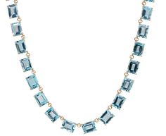 With its stunning, mesmerizing cool tone and fluid design, this Mateo necklace adds a regal vibe to any look. Each of the emerald cut blue topaz is set in an open backed setting of 14K yellow gold and connects to the next one with a tiny 14K yellow gold loop. The continuous strand of stones creates a timeless heirloom which can be worn as a show-stopping solo piece of jewelry or layered with other favorites. total length : 16" : 14K yellow goldblue topaz : 7mm x9mm each 14K yellow gold safety cl Riviera Necklace, Alice Cicolini, Digby And Iona, Mens Designer Jewelry, Zoe Chicco, Fluid Design, Cathy Waterman, Single Stone, Blue Necklace