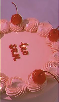 a pink cake with white frosting and cherries on top that says 80th