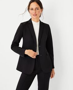 Elevate your professional wardrobe with the Ann Taylor Two Button Blazer in Double Knit. This blazer combines sophistication with comfort, featuring a stretchy, wrinkle-resistant fabric that ensures you stay chic without sacrificing comfort. Perfect for mixing and matching, this piece is a versatile addition to any ensemble.

- Size: 0
- Color: Black
- Gender: Female
- Material: Shell - 78% Polyester, 15% Rayon, 7% Spandex; Lining - 100% Polyester
- Fit: Relaxed fit
- Length: Hits at hip, approx Knitted Suit, Women's Blazers, Professional Wardrobe, Womens Blazers, Double Knit, Blazer Buttons, Black Blazer, Double Knitting, Black Blazers